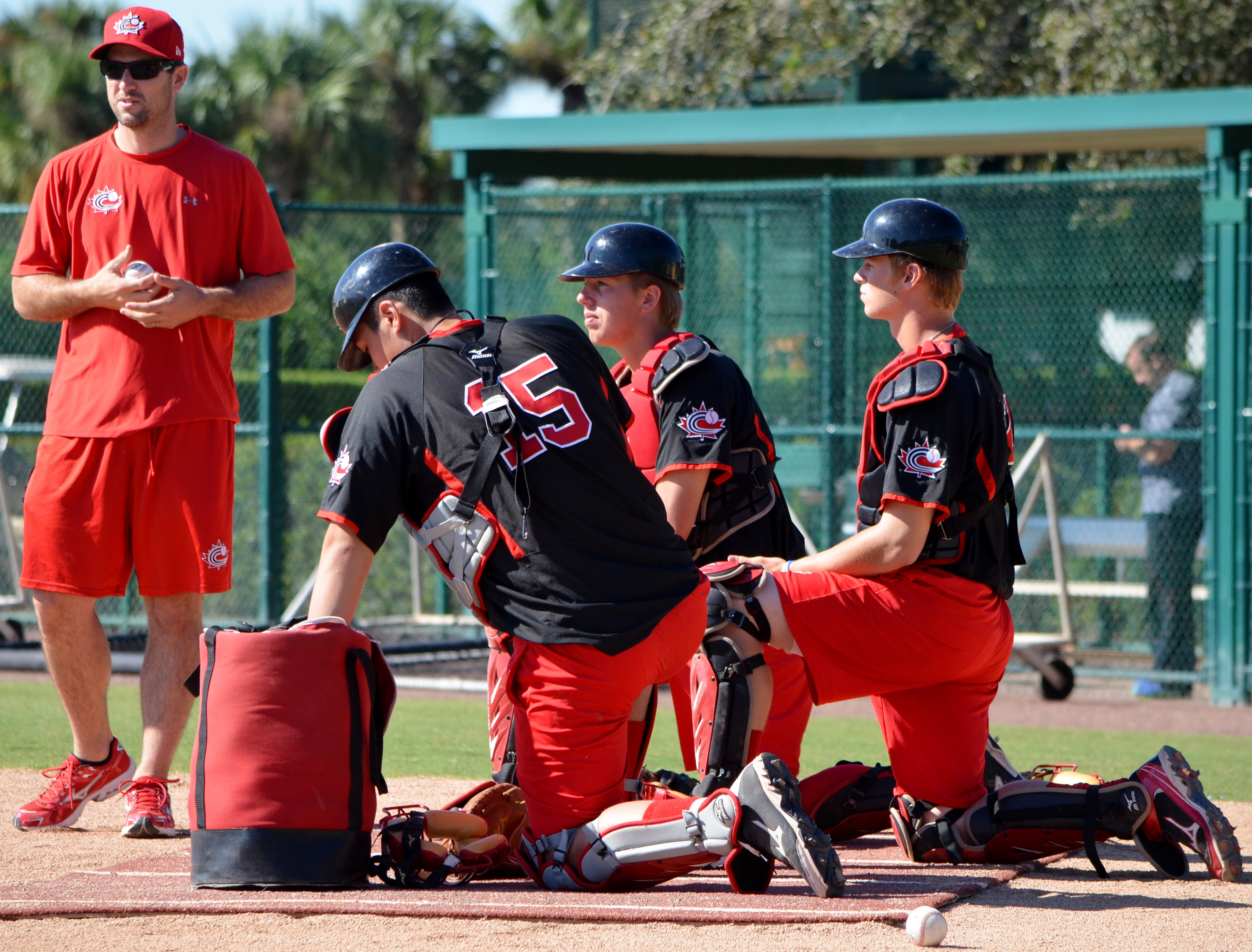Chris Robinson instructing the three JNT Catchers